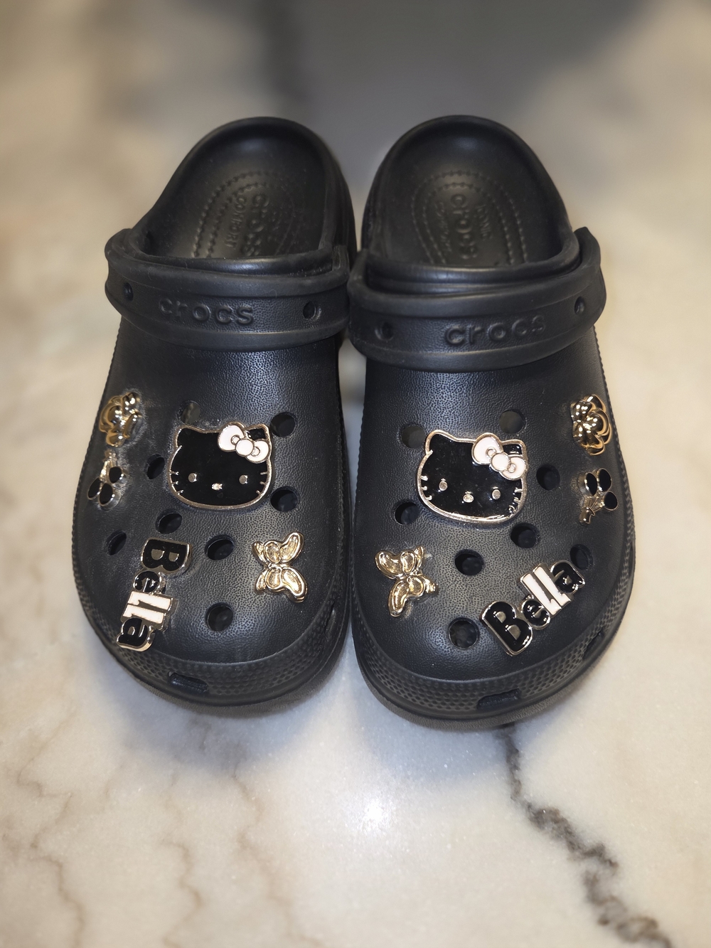 CROCS  Black Clogs with Gold Hello Kitty Charms